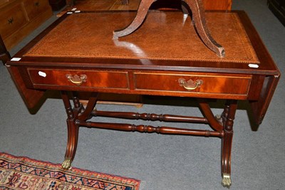 Lot 538 - A sofa table with leather inset top