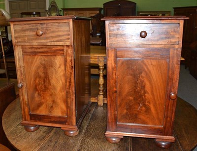 Lot 559 - Two mahogany bedside cabinets