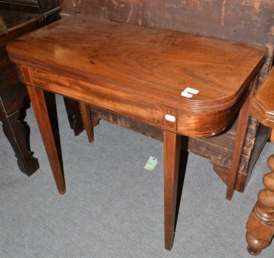 Lot 570 - A George III mahogany tea table