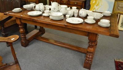 Lot 572 - An oak refectory dining table