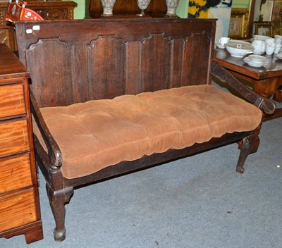 Lot 573 - Oak four panel settle