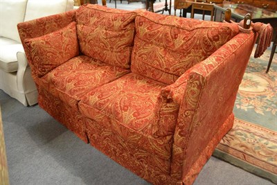 Lot 575 - A red upholstered Knoll style settee