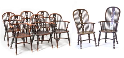 Lot 836 - A Harlequin Set of Six Yewwood and Elm Windsor Armchairs, mid 19th century, with double spindle...