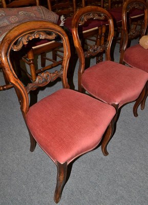 Lot 584 - Four Victorian walnut balloon back chairs