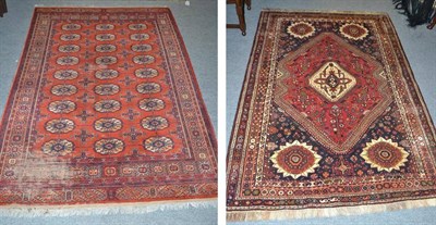 Lot 589 - Kashgai rug, South west Persia, the brick red field centred by a cream medallion framed by...