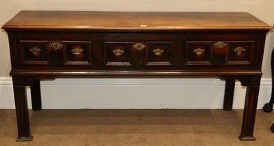 Lot 837 - A 17th Century Joined Oak Dresser, the top with cleated ends above three geometric moulded...