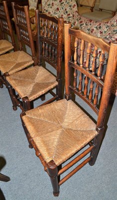 Lot 594 - Six spindle back chairs and two others