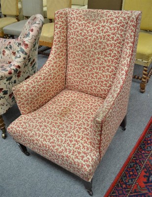 Lot 595 - Edwardian squared armchair in crimson chintz