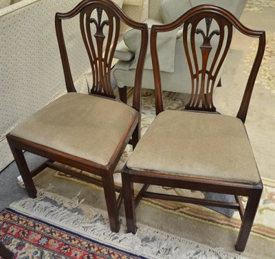 Lot 600 - A set of four George III style dining chairs