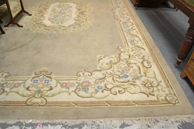 Lot 603 - Indian carved carpet of Chinese Savonnerie design, the mushroom field with floral medallion...