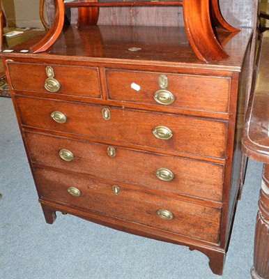 Lot 611 - A George III four height chest