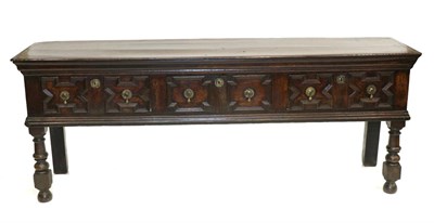 Lot 839 - A 17th Century Joined Oak Dresser, the top with cleated ends above three geometric moulded...