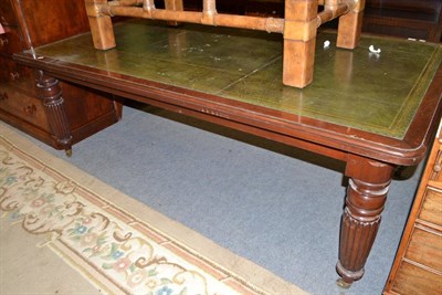 Lot 615 - A mahogany library table with leather top