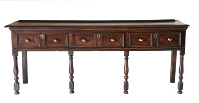 Lot 840 - A Joined Ash Open Dresser, circa 1700, with three two-as-one drawers, raised on baluster turned...