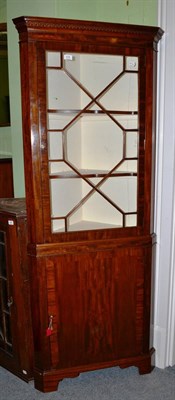 Lot 628 - A mahogany standing corner cabinet with glazed top