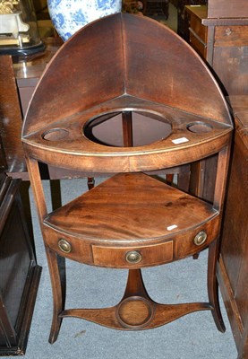 Lot 648 - A mahogany corner washstand