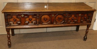 Lot 845 - A Late 17th Century Joined Oak Dresser, with three geometric moulded drawers and moulded...