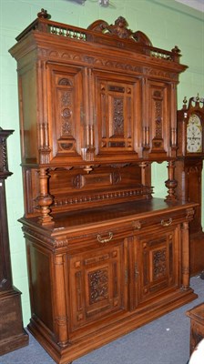 Lot 657 - A Victorian carved walnut sideboard