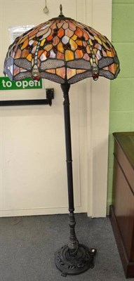 Lot 664 - A Tiffany style standard lamp