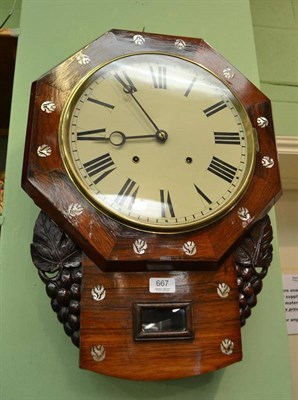 Lot 667 - A rosewood veneered striking wall clock