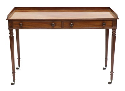 Lot 849 - A Regency Mahogany Writing Table, in the manner of Gillows, early 19th century, with a...