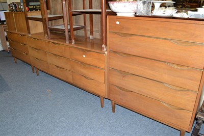 Lot 691 - 1950s brass mounted chest of drawers, sideboard and cupboard