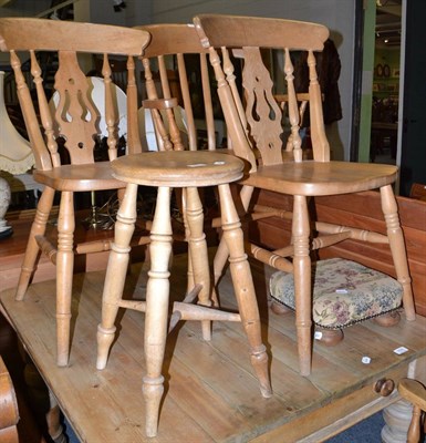 Lot 701 - Four pine chairs and three stools