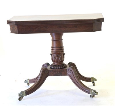 Lot 857 - A George IV Mahogany and Crossbanded Foldover Tea Table, 2nd quarter 19th century, of canted...