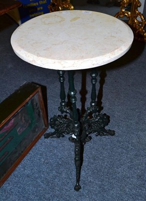 Lot 752 - A marble topped wine table