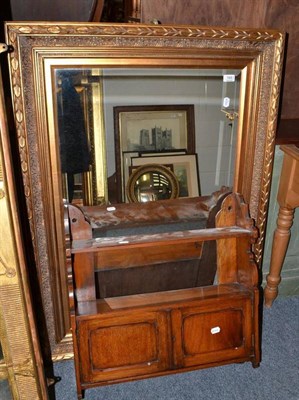 Lot 768 - A mahogany wall cabinet, a gilt mirror and pine table