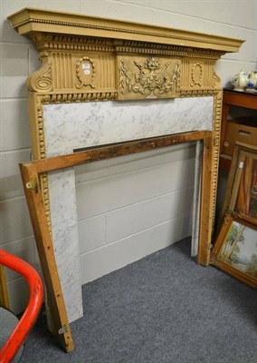 Lot 791 - A reproduction fire surround and a wooden surround