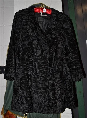 Lot 837 - Black Persian lamb fur coat, Harrods