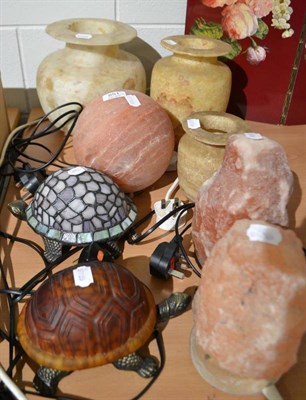 Lot 851 - Three Egyptian alabaster jars, two pink rock lamps, similar ball lamp and two tortoise lamps