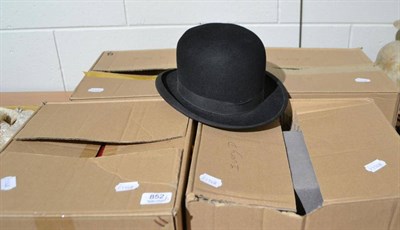 Lot 852 - Four modern top hats and a bowler hat