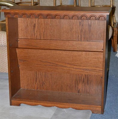 Lot 866 - A 19th century mahogany table and a Morris Furniture Company oak open bookcase (2)