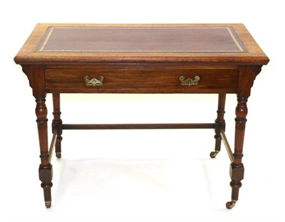 Lot 877 - A Late Victorian Walnut Writing Desk, stamped James Schoolbred, late 19th century, with a red...