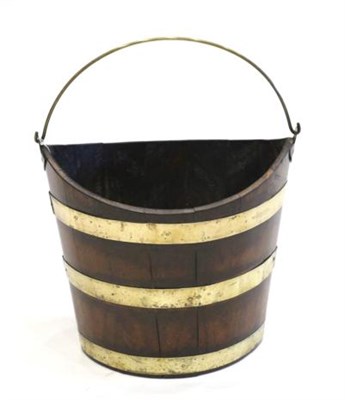 Lot 881 - A George III Mahogany and Brass Bound Peat Bucket, late 18th century, of staved construction...