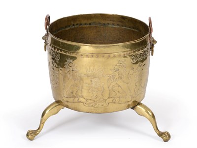 Lot 883 - A Large 19th Century Dutch Brass and Copper Log Bin, the riveted body with lion mask drop...