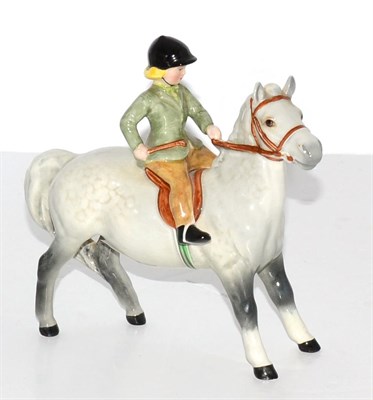 Lot 5092 - Beswick Girl on Pony, model No 1499, light dapple grey gloss