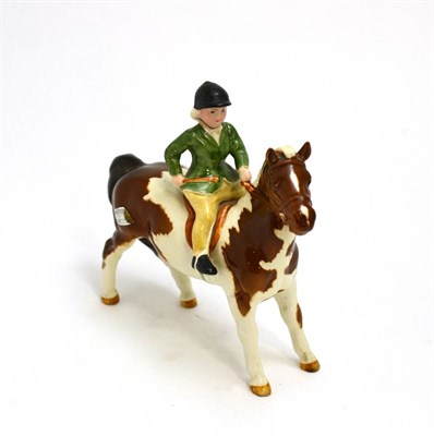 Lot 5099 - Beswick Girl on Pony, model No. 1499, Skewbald gloss