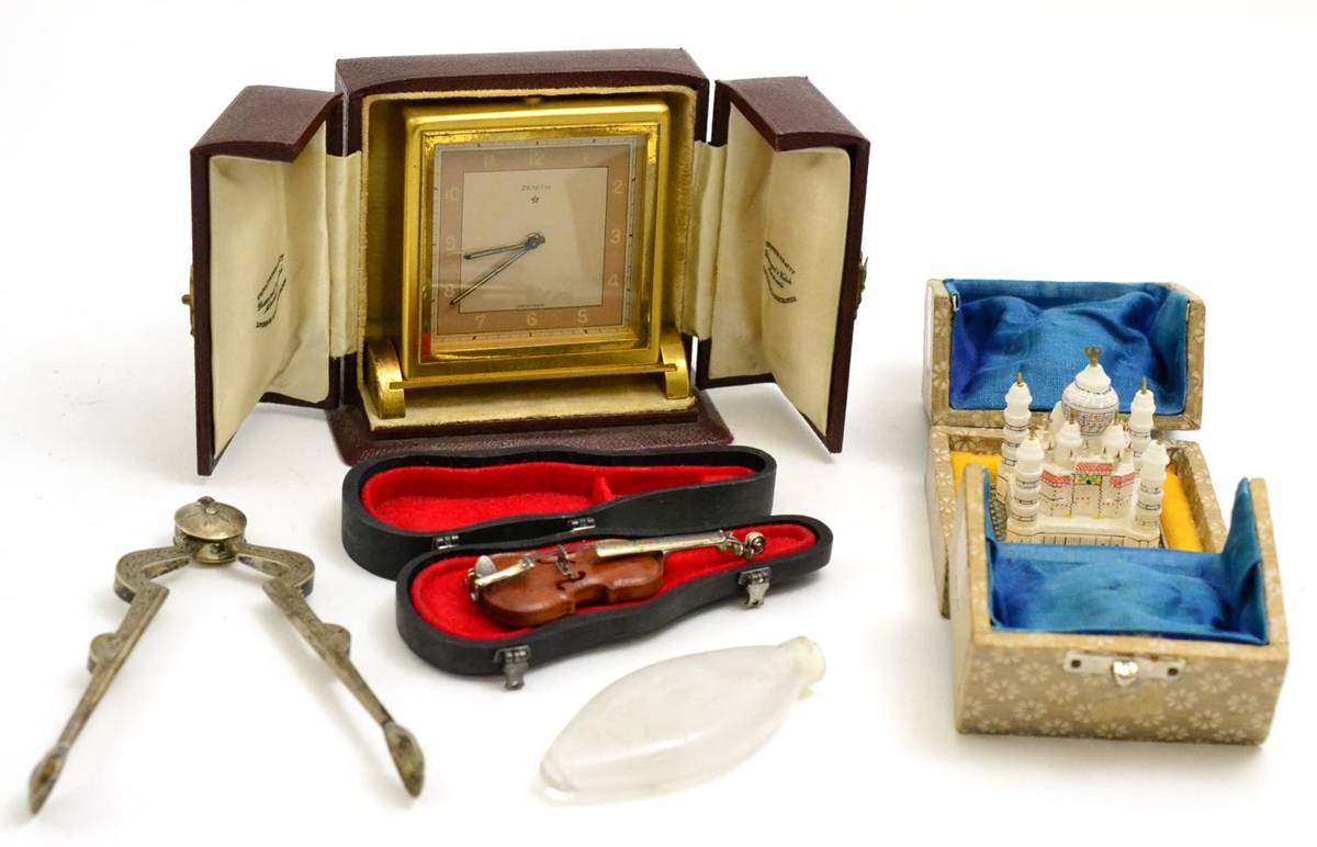 Lot 5141 - Pair of silver sugar nips, cased Zenith travel clock, miniature cased violin with 925 mount,...