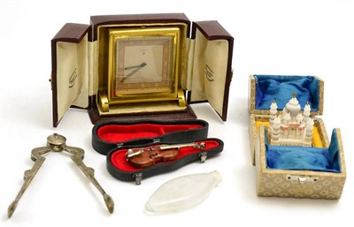 Lot 5141 - Pair of silver sugar nips, cased Zenith travel clock, miniature cased violin with 925 mount,...