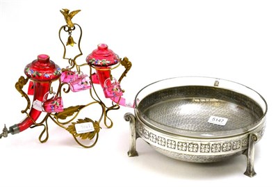 Lot 5147 - WMF bowl with glass liner and a Bohemian ruby glass liqueur set on gilt metal stand (2)