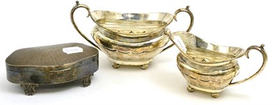 Lot 5152 - A silver cream and sugar together with a silver jewellery box and thimble