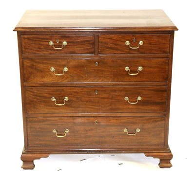 Lot 890 - A George II Mahogany Straight Front Chest of Drawers, circa 1800, the moulded top above two...