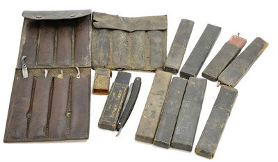 Lot 5162 - Two leather pouches and eight cases of cut throat razors
