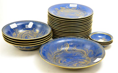 Lot 5168 - A Wedgwood part dinner service decorated with gilt dragon on a powder blue ground, made for...