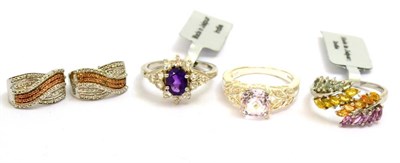 Lot 5207 - A pair of diamond set earrings, a pink stone ring, a multi colour sapphire ring and an amethyst and