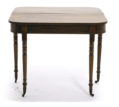 Lot 896 - A Mahogany Foldover Tea Table, circa 1820, of D shape form with reeded edge above a plain...