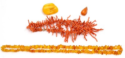 Lot 5221 - An amber bead necklace, two amber pendants and a twig coral necklace